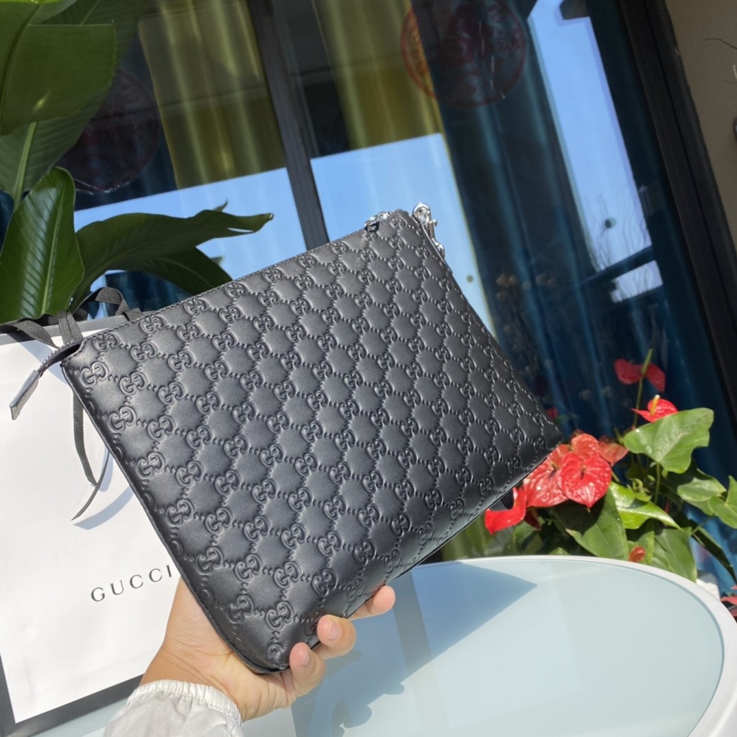 Gucci men's leather clutch bag