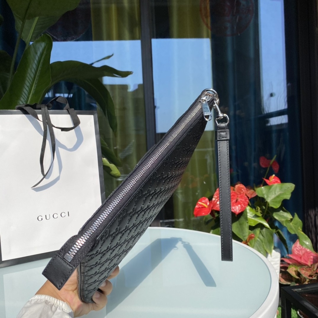 Gucci men's leather clutch bag