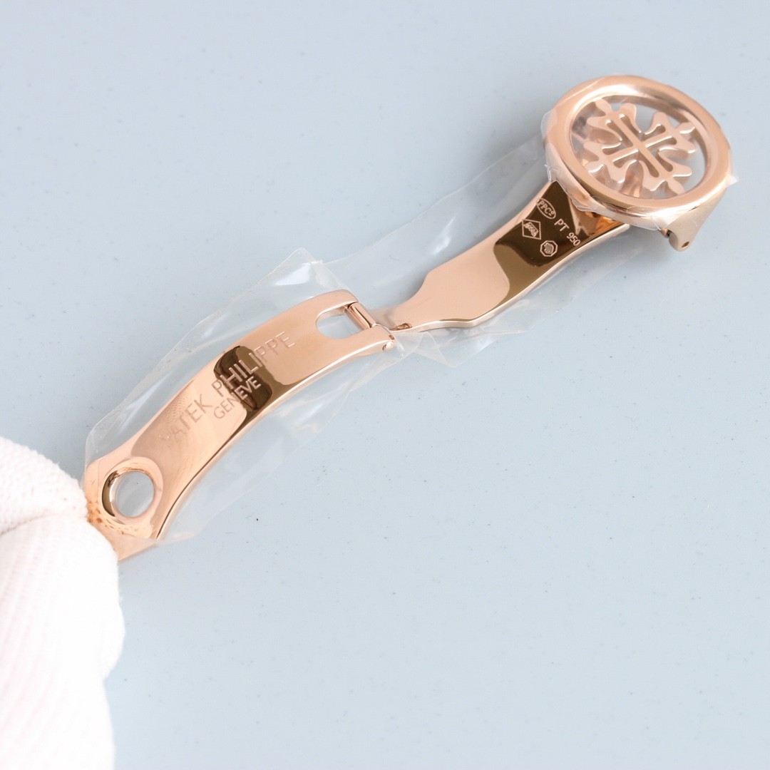 Patek Philippe rose gold diamond-set complicated watch