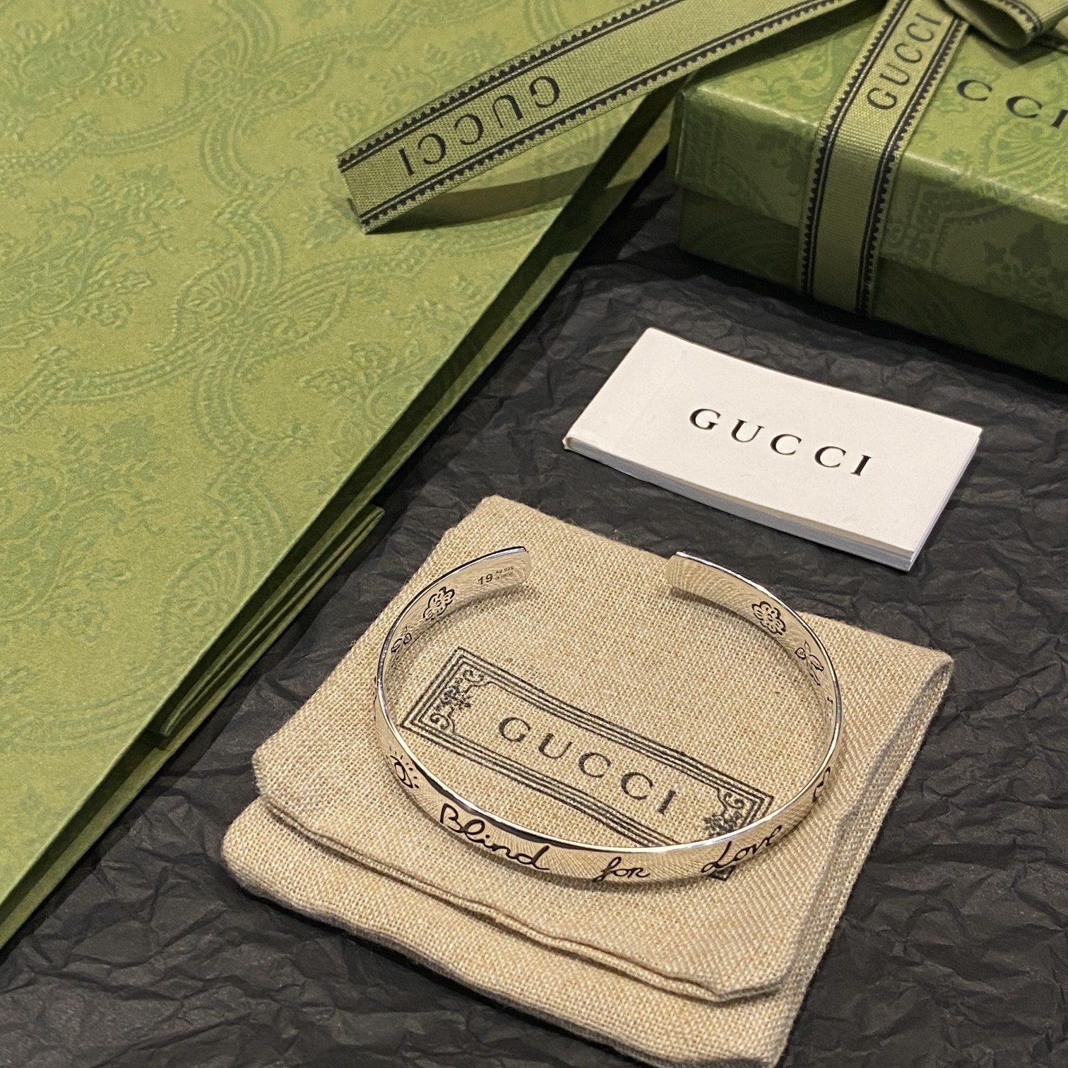 Gucci wide bird and flower bracelet