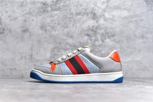 Gucci Screener series distressed sneakers, grey, blue, and orange colorway.