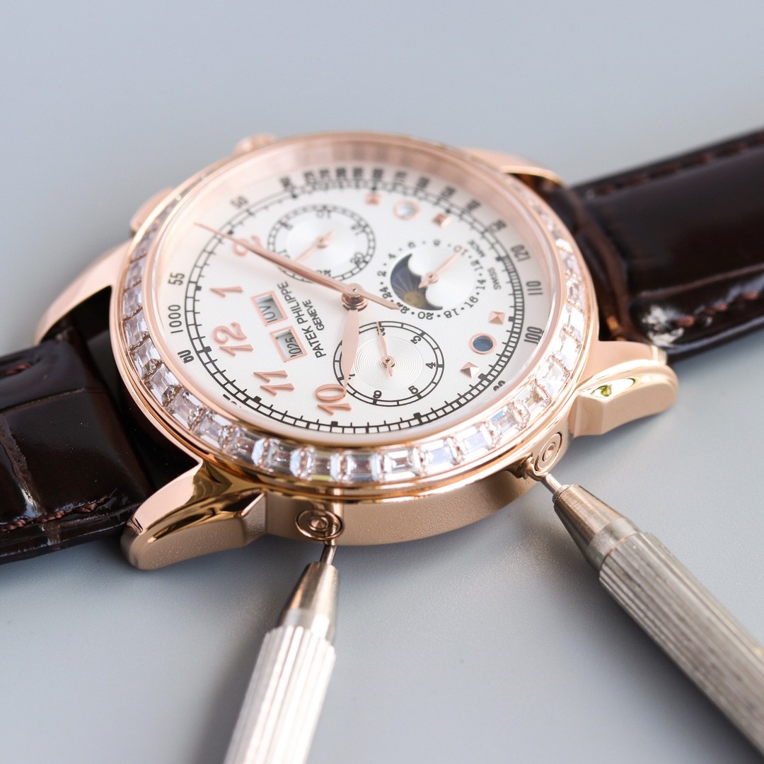 Patek Philippe rose gold diamond-set complicated watch