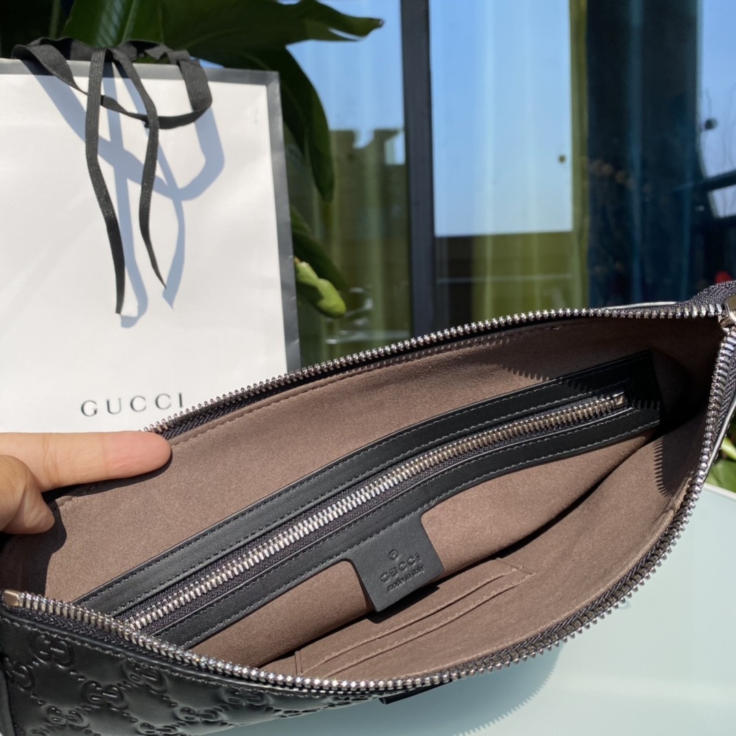Gucci men's leather clutch bag