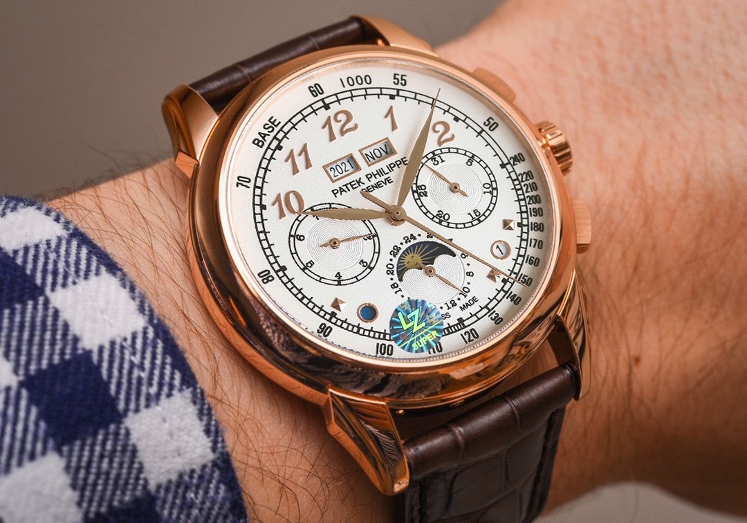 Patek Philippe rose gold diamond-set complicated watch