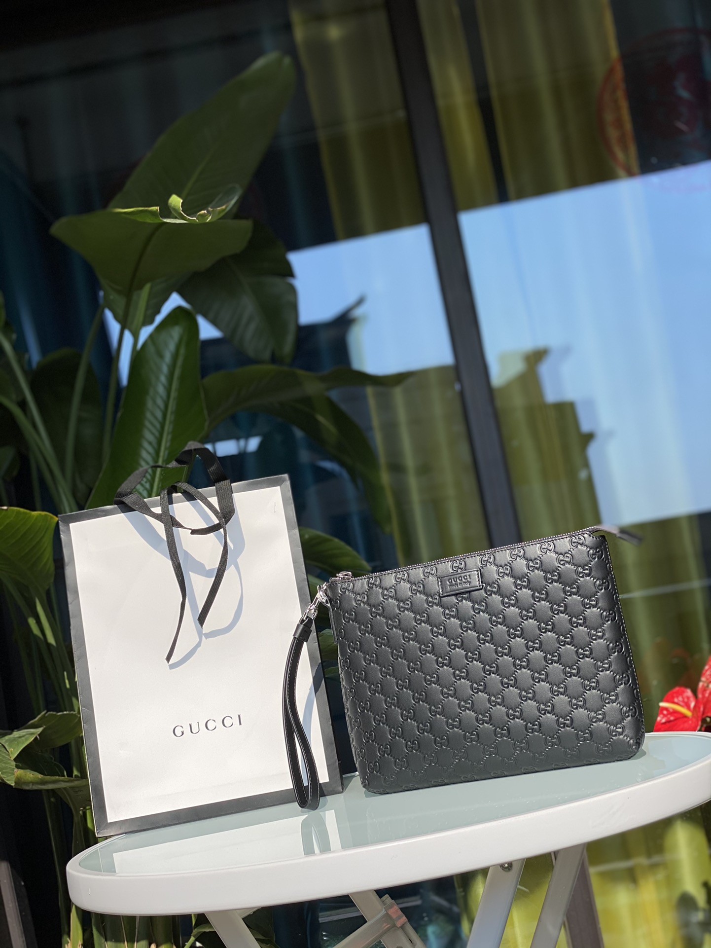 Gucci men's leather clutch bag