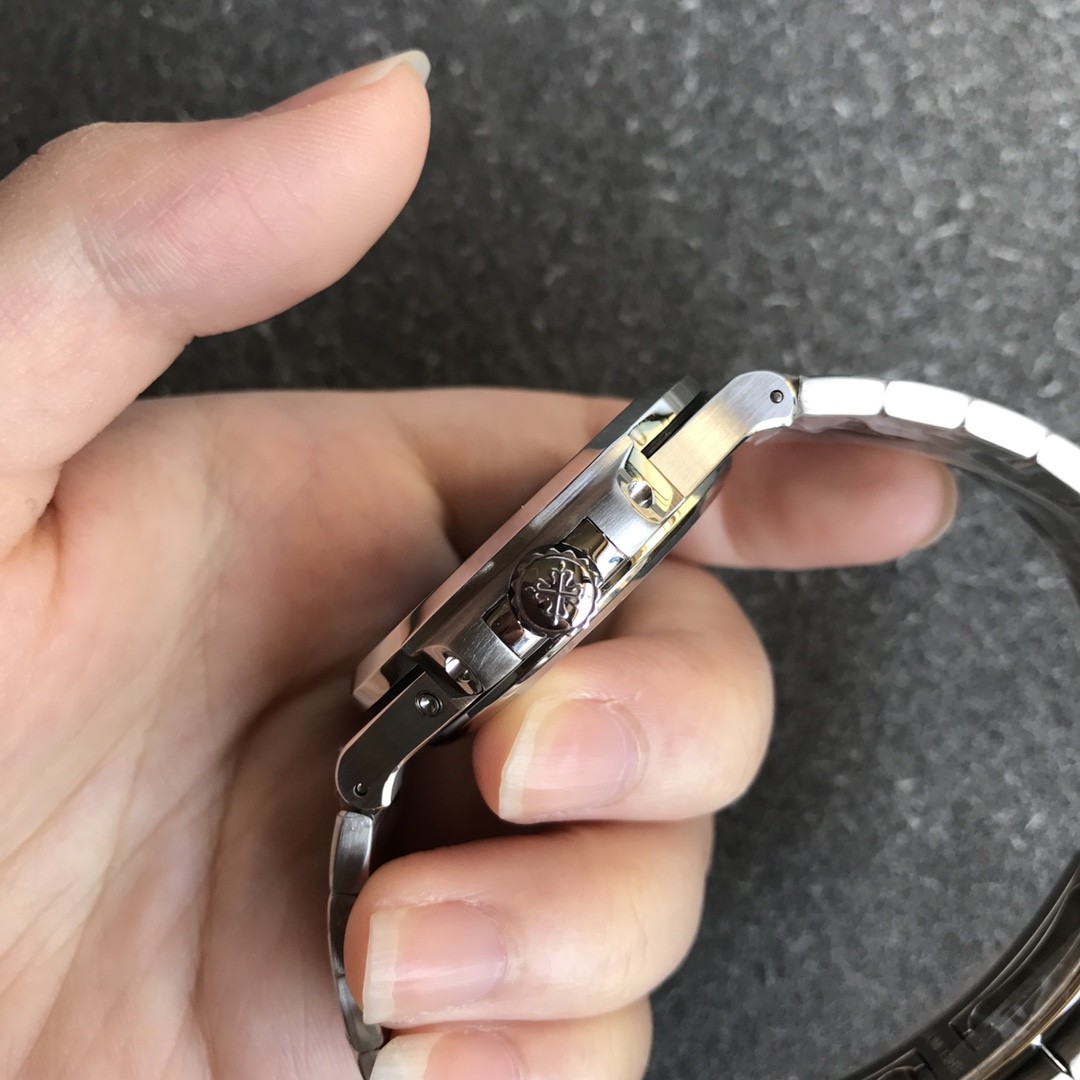 This is a Patek Philippe Nautilus 5712/1A watch.